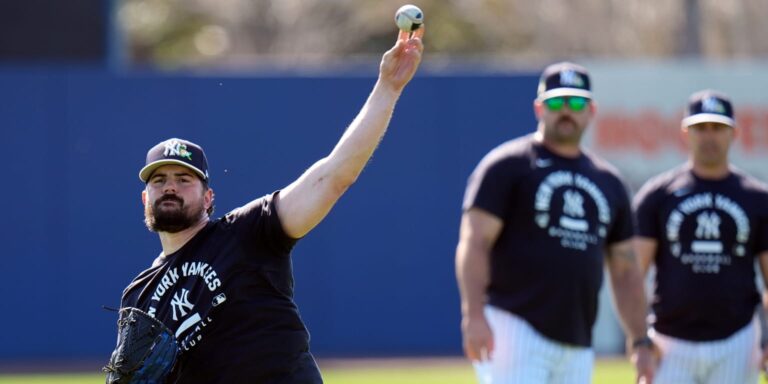 Carlos Rodón reports to camp after elbow surgery