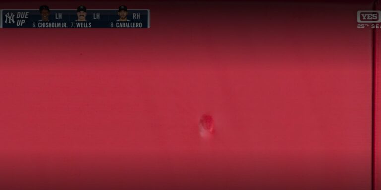 Giancarlo Stanton leaves a mark on Yankee Stadium left-field wall