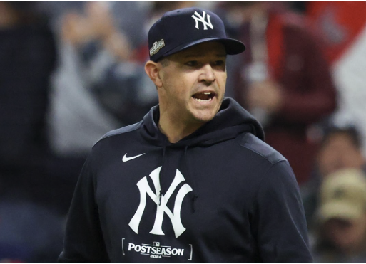 Matt Blake wearing Yankees postseason apparel